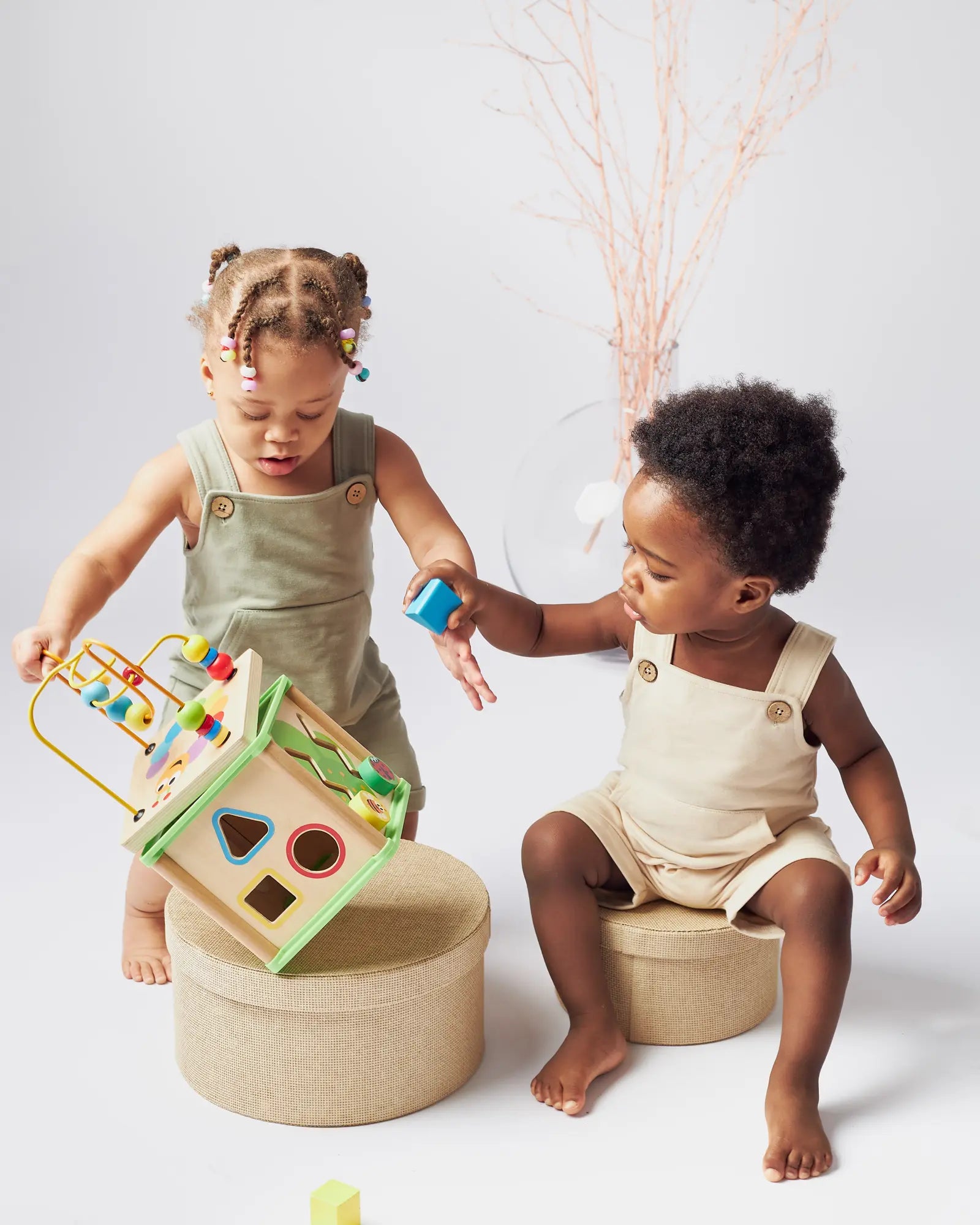 Paalm Baby organic baby clothes; two babies playing in organic cotton essentials