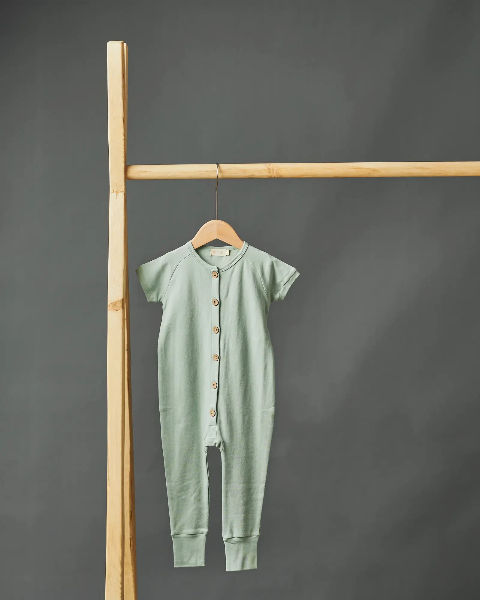AEMI organic cotton baby pajamas with coconut shell buttons Mint | Paalm Baby Clothing Nigeria