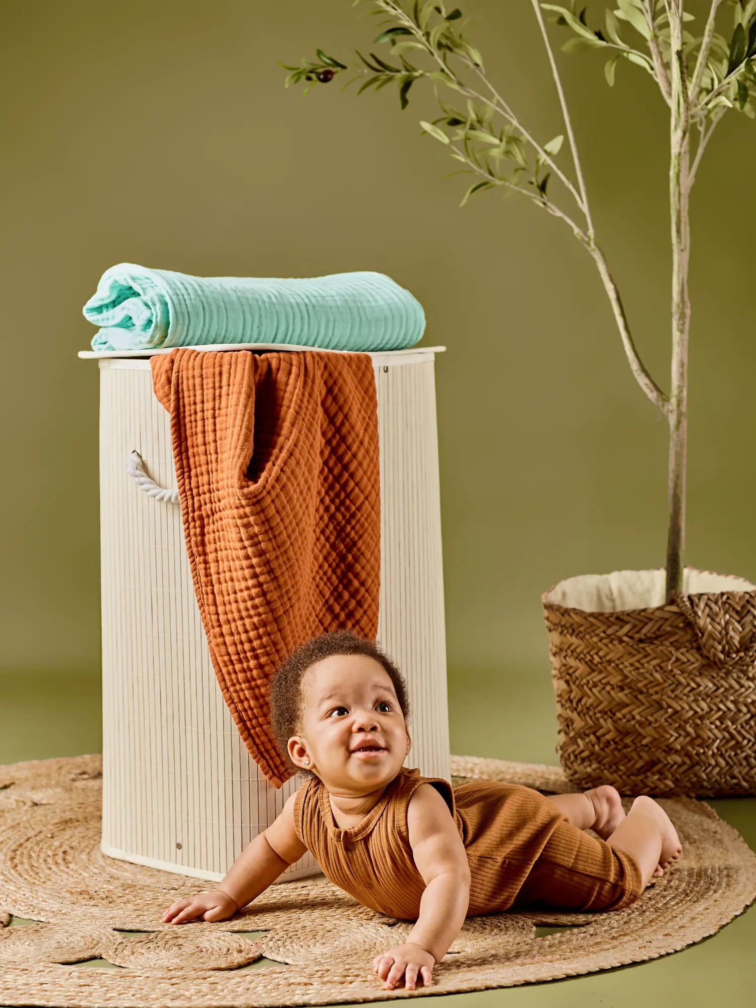 Noli organic ribbed baby romper - GOTS certified cotton cinnamon on a crawling baby | Paalm Baby Clothing Nigeria