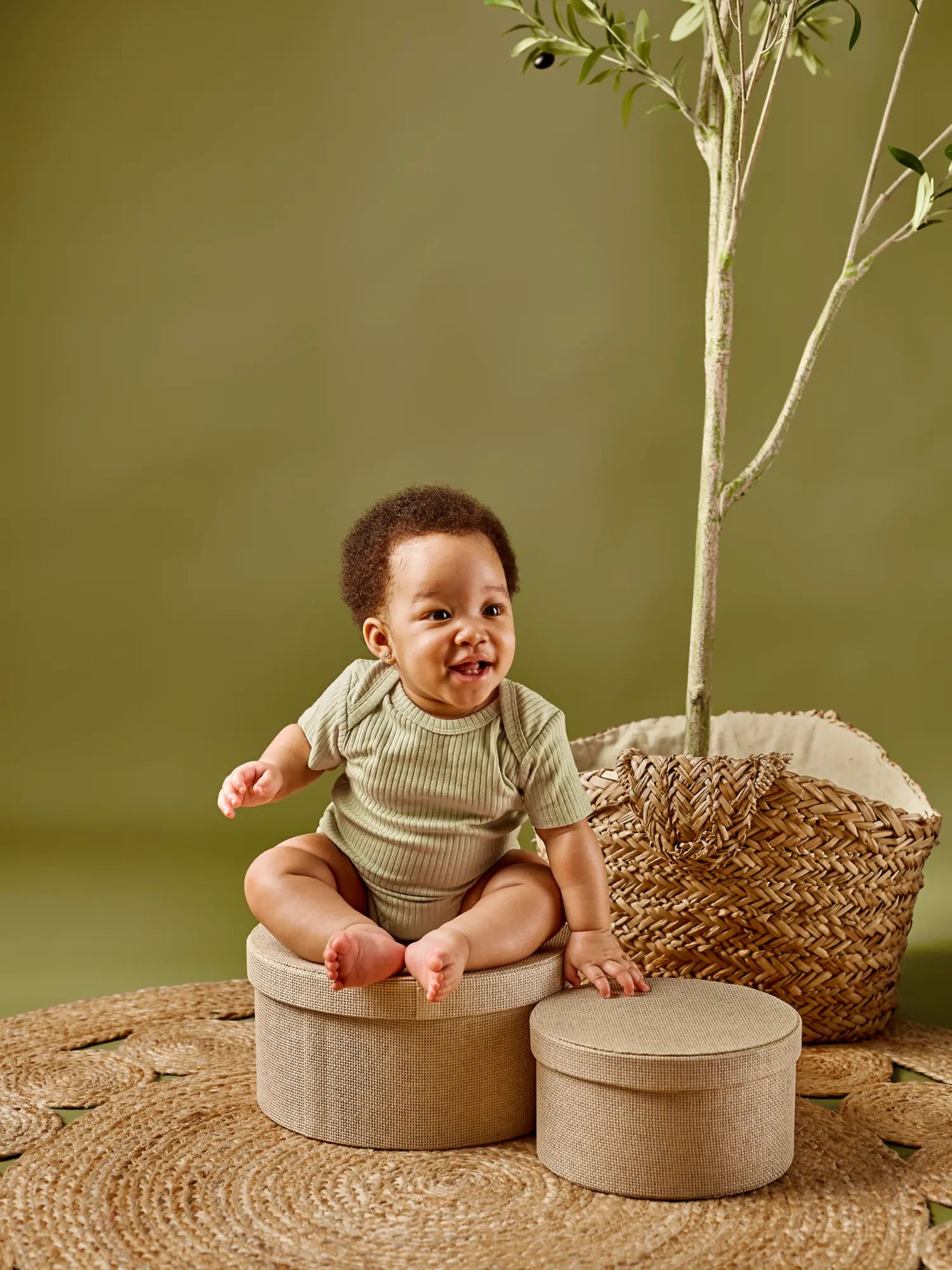 Ari organic ribbed baby bodysuit onesie - lead-free snaps pistachio on baby sitting | Paalm Baby Clothing Nigeria